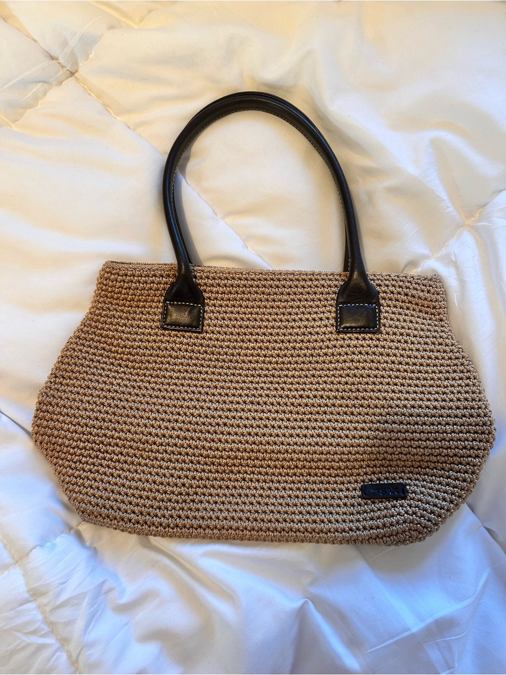The Sak Woven Tan Tote with Black Handles